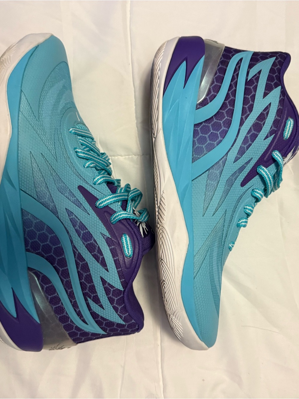Men’s Puma MB.02 shoes Mid-Top Athletic Shoes in Teal and Purple